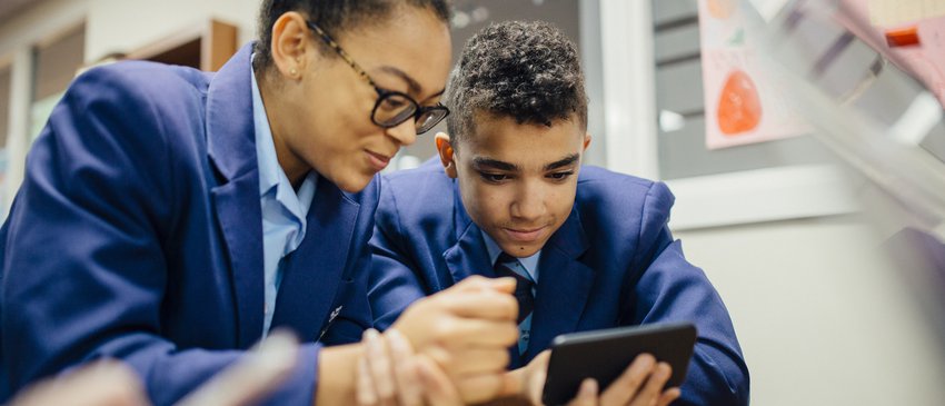 Secondary students with tablet for technology survey