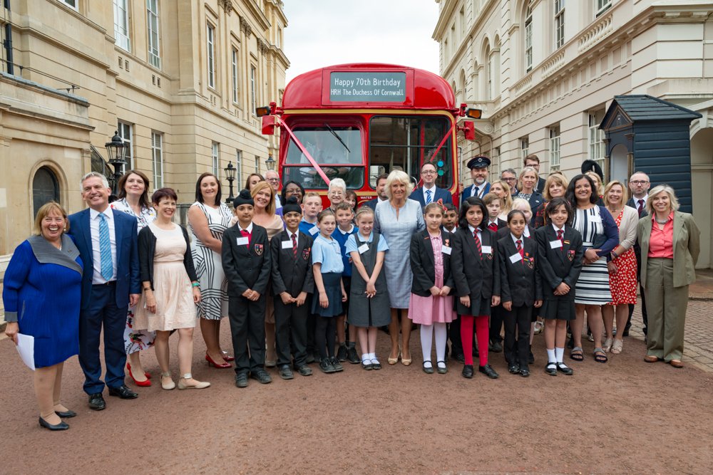 HRH authors, pupils and charity partners at duchess's bookselves