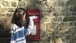 Girl posting letter