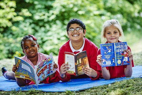 Kids with books in Leicester.jpg