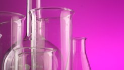 pink beakers stock image.jpeg